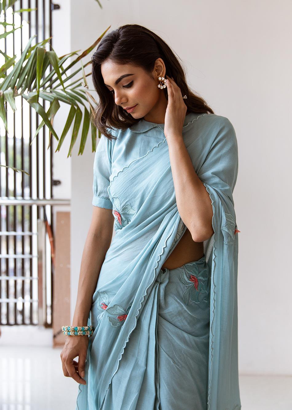 Stylish Powder Blue Mulmul Diya Embossed Embroidered Saree - JOVI India